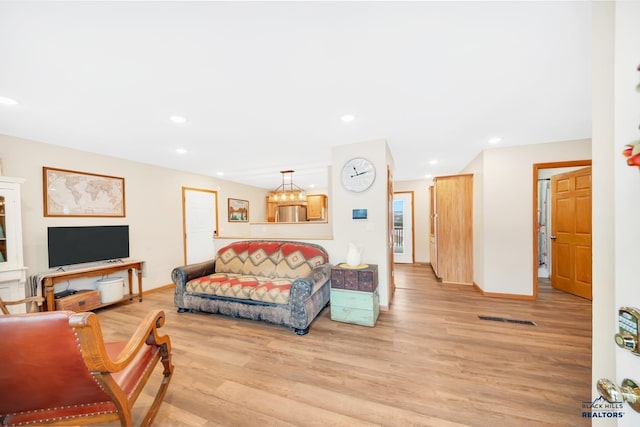 living room featuring light hardwood / wood-style flooring