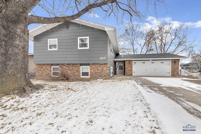 tri-level home featuring a garage