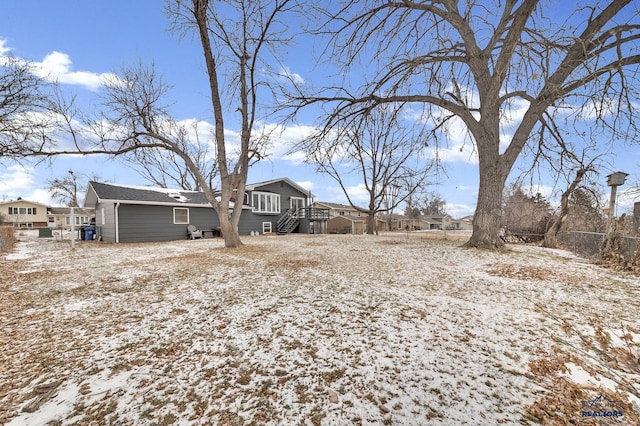 view of yard covered in snow