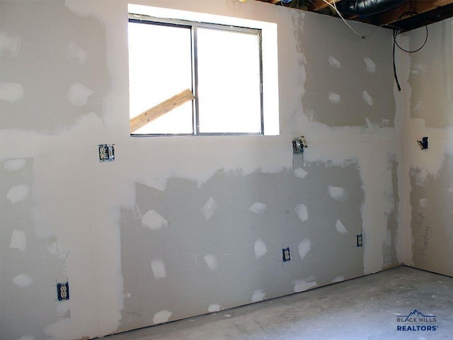 interior space featuring concrete flooring