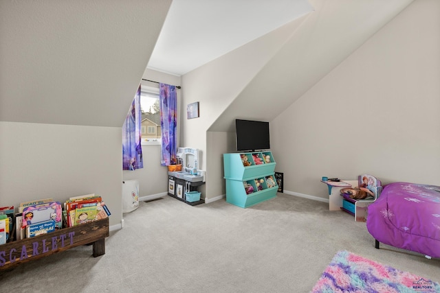 game room featuring light carpet and vaulted ceiling