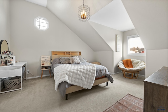 bedroom featuring light colored carpet and vaulted ceiling