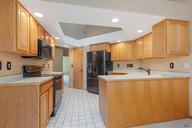 kitchen with light tile patterned flooring, sink, stainless steel fridge, kitchen peninsula, and black range with electric stovetop