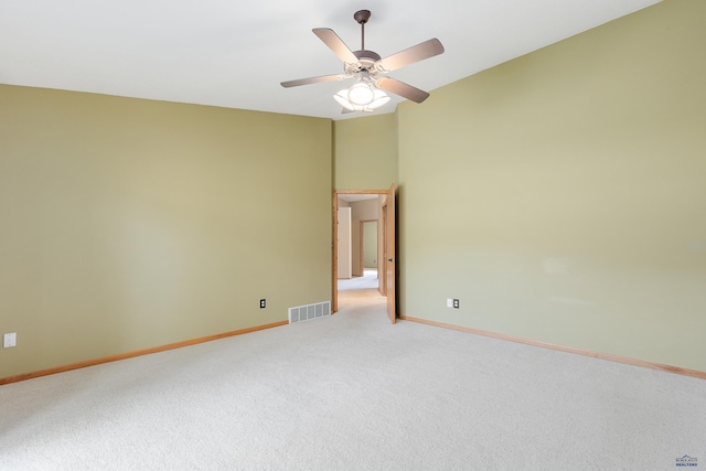 unfurnished room with ceiling fan and carpet flooring