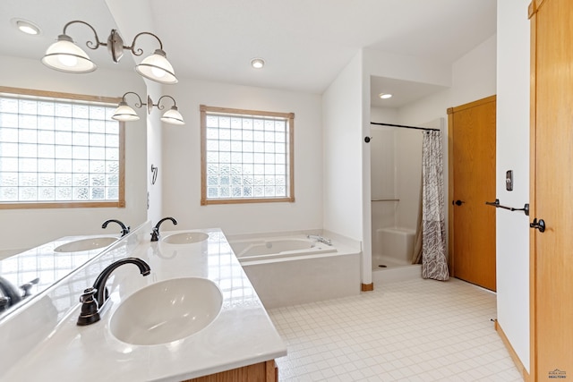 bathroom featuring vanity and plus walk in shower