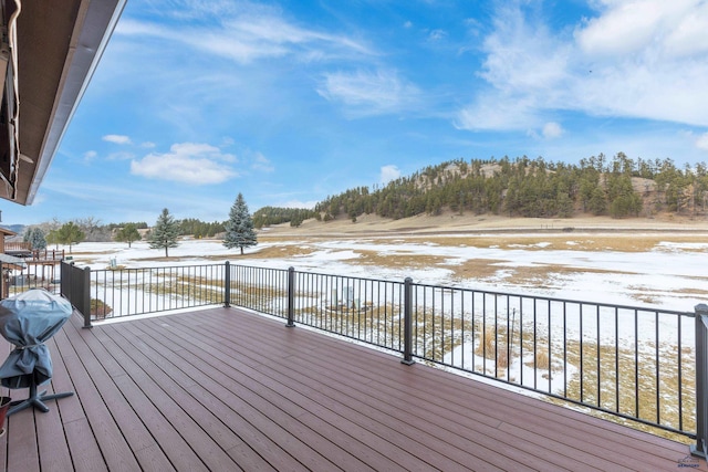 view of snow covered deck