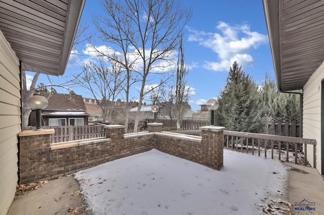 view of snow covered patio