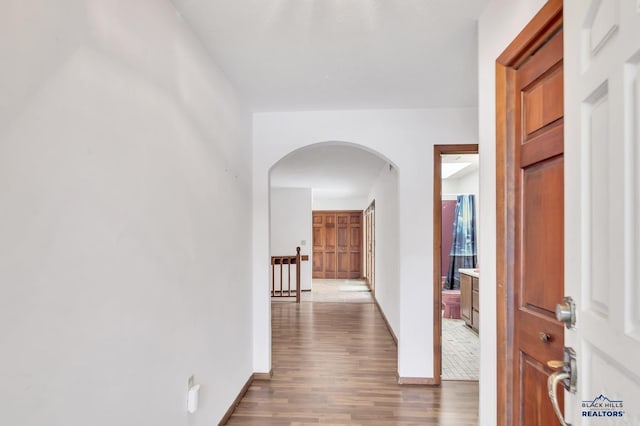 hall featuring wood-type flooring