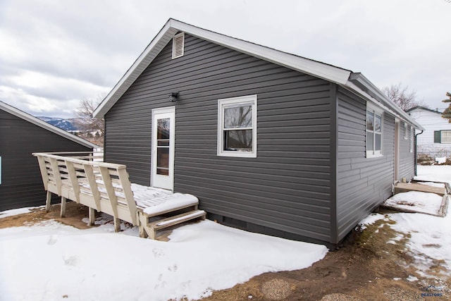 view of snow covered property