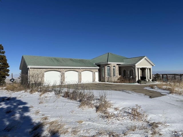 14390 Edgewood Pl, Piedmont, SD 57769 - view of front of property featuring an attached garage and driveway