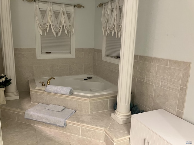 14390 Edgewood Pl, Piedmont, SD 57769 - bathroom with a garden tub and tile patterned floors