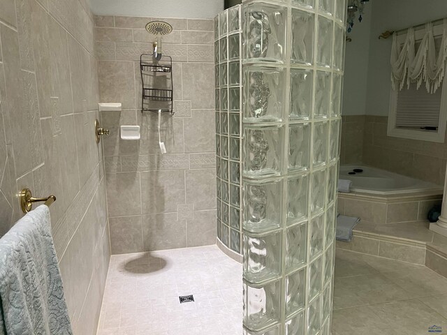 14390 Edgewood Pl, Piedmont, SD 57769 - bathroom featuring a bath, a walk in shower, and tile patterned floors