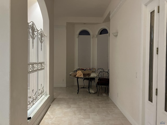 14390 Edgewood Pl, Piedmont, SD 57769 - hallway with baseboards and arched walkways