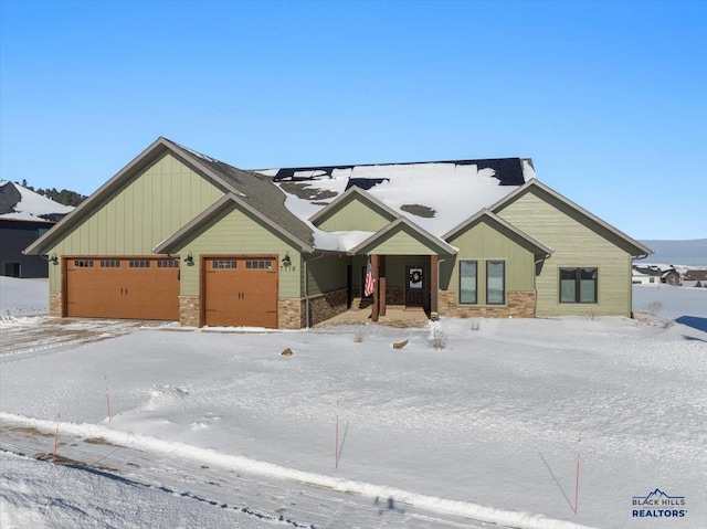 craftsman-style home with a garage