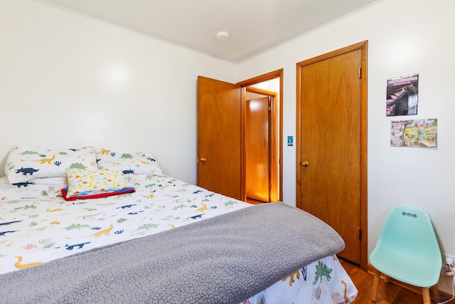 bedroom featuring hardwood / wood-style floors