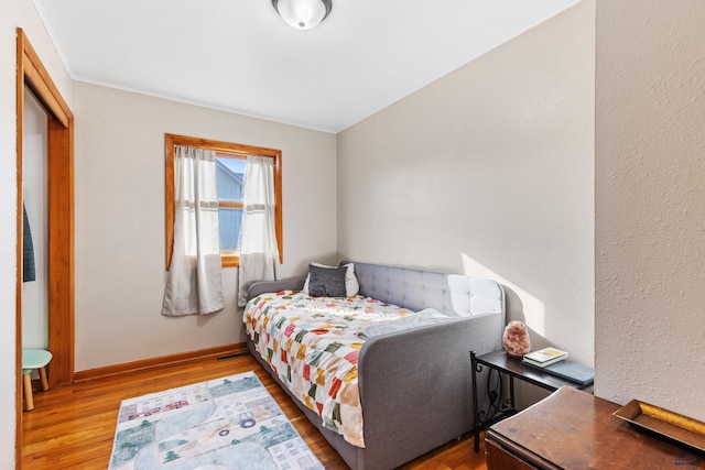 bedroom featuring light hardwood / wood-style flooring