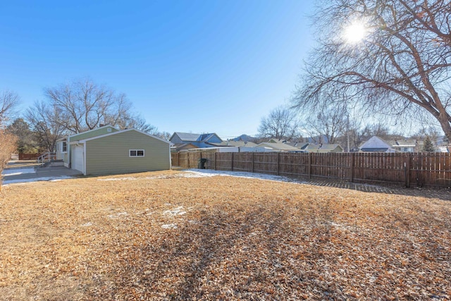 view of yard with a garage