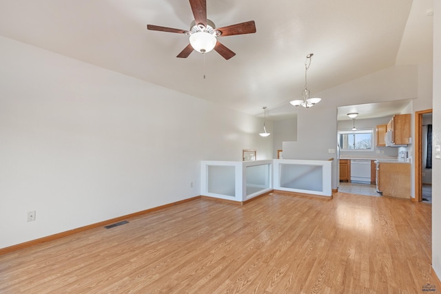 unfurnished living room with lofted ceiling, light hardwood / wood-style flooring, and ceiling fan