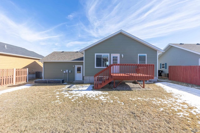 rear view of house with a deck