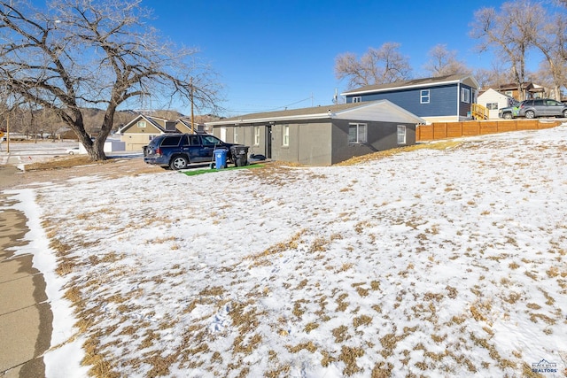 view of yard layered in snow