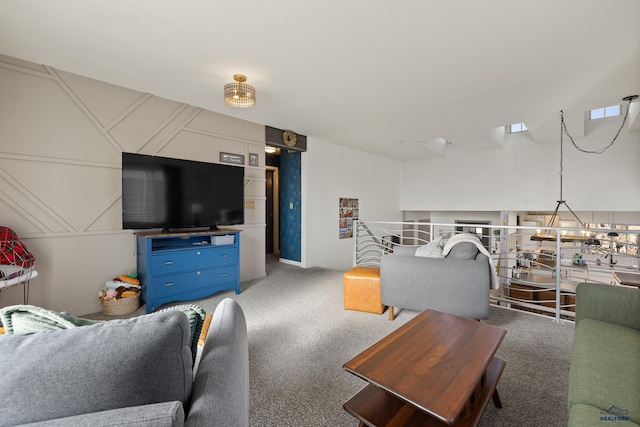 living room with dark colored carpet