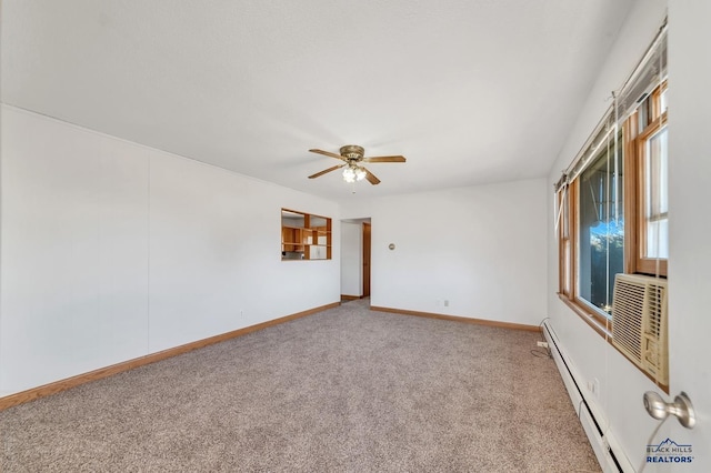 carpeted empty room with ceiling fan and baseboard heating