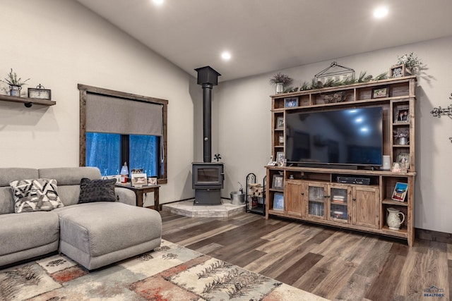 23232 Clear Creek Rd, Rapid City, SD 57702 - living room featuring lofted ceiling, wood-type flooring, and a wood stove