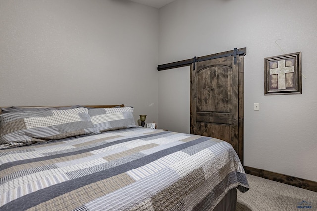 23232 Clear Creek Rd, Rapid City, SD 57702 - carpeted bedroom featuring a barn door