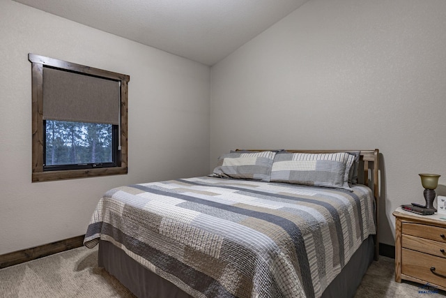 23232 Clear Creek Rd, Rapid City, SD 57702 - carpeted bedroom featuring lofted ceiling
