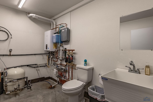 23232 Clear Creek Rd, Rapid City, SD 57702 - bathroom with sink, concrete flooring, water heater, and toilet