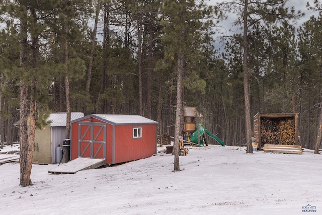 23232 Clear Creek Rd, Rapid City, SD 57702 - snow covered structure with a playground