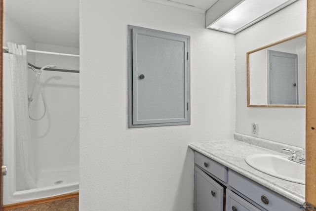 318 4th Ave, Wall, SD 57790 - bathroom featuring vanity and a shower