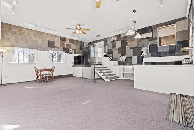 318 4th Ave, Wall, SD 57790 - carpeted living room with ceiling fan and track lighting