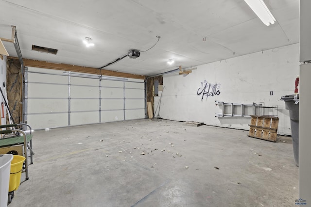 318 4th Ave, Wall, SD 57790 - garage with a garage door opener and electric panel