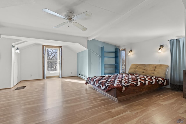 318 4th Ave, Wall, SD 57790 - bedroom with lofted ceiling with beams, ceiling fan, light wood-type flooring, and baseboard heating