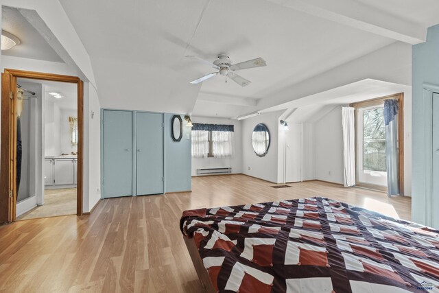 318 4th Ave, Wall, SD 57790 - bedroom featuring light wood-type flooring and baseboard heating