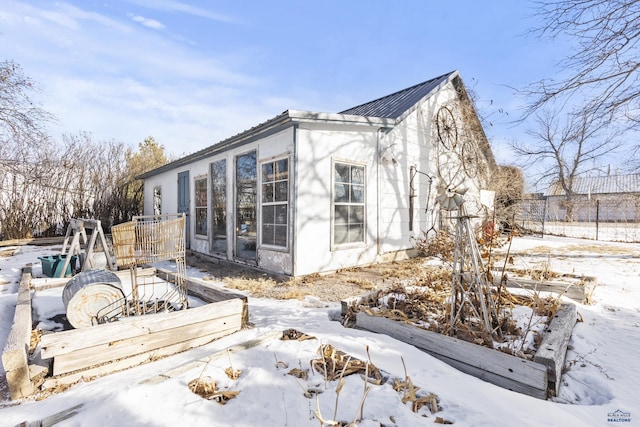 318 4th Ave, Wall, SD 57790 - view of snowy exterior