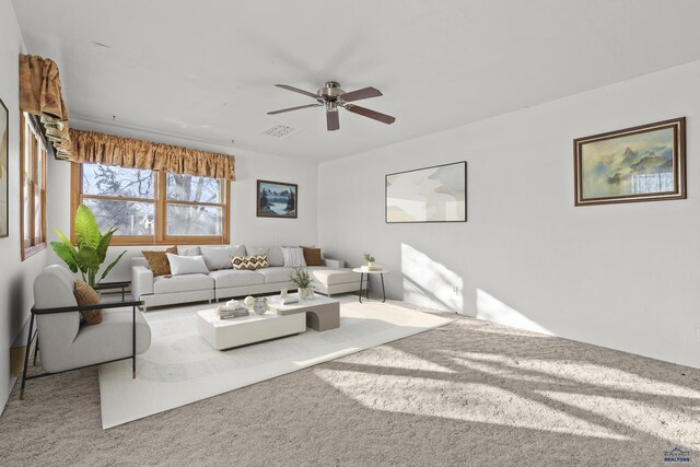 318 4th Ave, Wall, SD 57790 - living room featuring carpet floors and ceiling fan