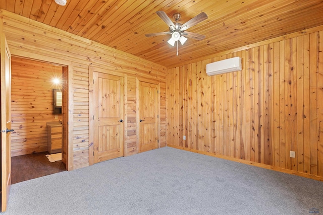 unfurnished bedroom featuring carpet flooring, wooden walls, wood ceiling, and a wall unit AC