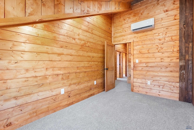 carpeted empty room with wooden walls and a wall unit AC