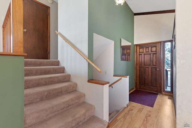 entrance foyer with light hardwood / wood-style flooring