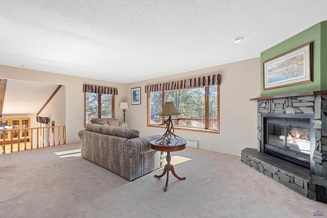 living room with a fireplace, light carpet, and a textured ceiling