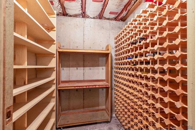 wine cellar featuring concrete floors