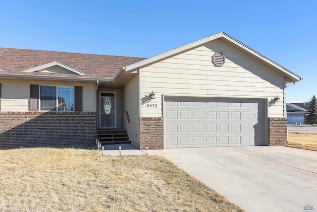 single story home with a garage