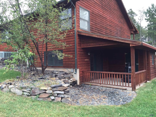 369 Deegan Dr, Hill City, SD 57745 - view of property exterior featuring a porch