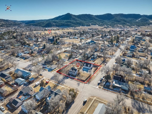 drone / aerial view featuring a mountain view