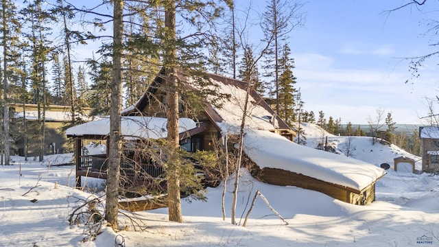 view of snow covered property