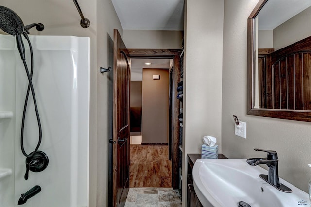 bathroom featuring sink and shower / washtub combination