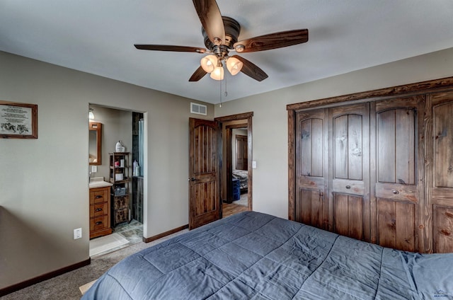 bedroom with ceiling fan and light colored carpet