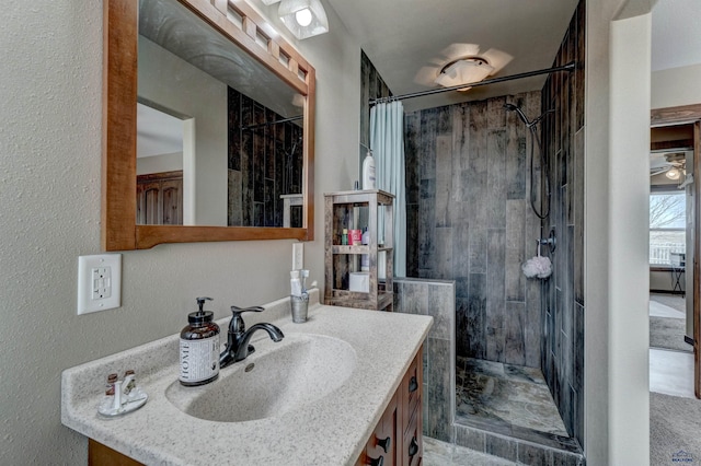 bathroom featuring vanity and a shower with shower curtain